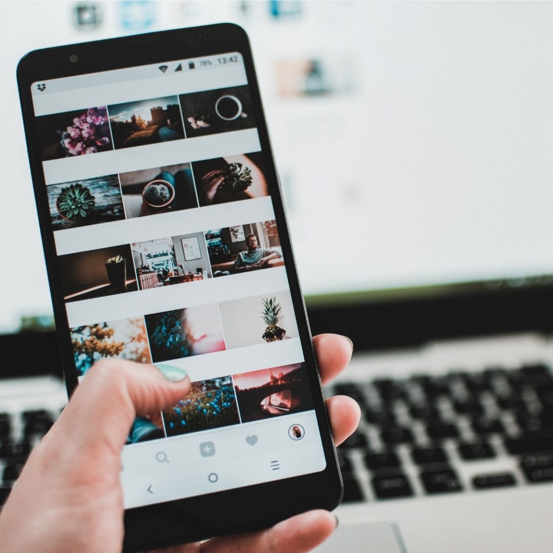 Fika Digital - How to develop a winning instagram hashtag strategy - upclose photo showing someone scrolling plant photos on Instagram